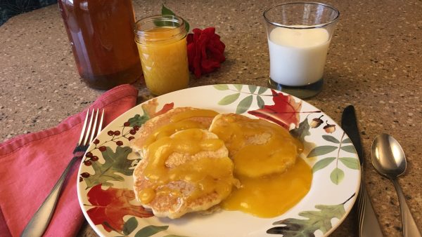 Whole Wheat Pancakes with Honey Peach Syrup